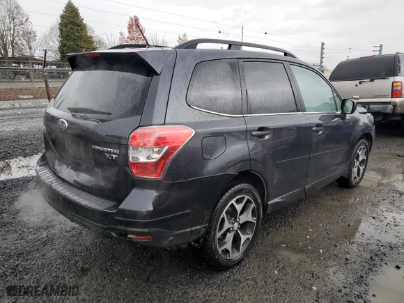 2014 Subaru Forester 2.0XT Premium with VIN JF2SJGDC9EH499538, listed as a Copart auction lot 84694014 with 128,547 mi miles and Salvage Title. Bid and sale history available at carsss.com. Image 3.