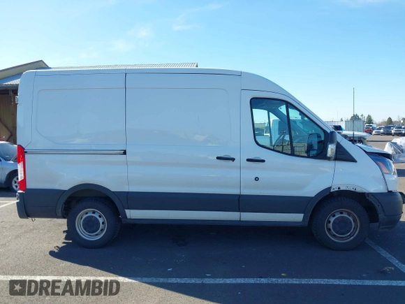 2019 Ford Transit z VIN 1FTYR1CM7KKB27462, wystawiony jako IAAI lot #41644752 z przebiegiem 94 260 mil mil oraz . Historia ofert i sprzedaży dostępna na DreamBid. Obrazek 13.