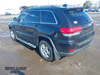 2017 Jeep Grand Cherokee Laredo with VIN 1C4RJEAGXHC685888, listed as a IAAI auction lot 41563643 with 193,997 mi miles. Bid and sale history available at carsss.com. Image 3.