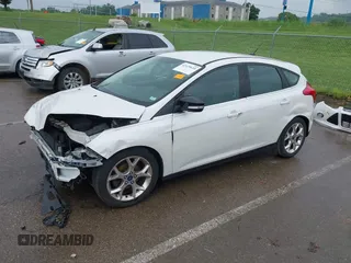 2014 Ford Focus Titanium with VIN 1FADP3N24EL184220, listed as a IAAI auction lot 42429610 with 172,575 mi miles and . Bid and sale history available at DreamBid. Image 21.