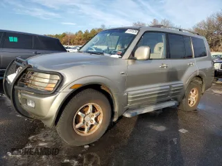 2002 Mitsubishi Montero Limited z VIN JA4MW51R12J020808, wystawiony jako Copart lot #41915255 z przebiegiem 127 834 mil mil oraz Tytuł czysty. Historia ofert i sprzedaży dostępna na DreamBid. Obrazek 1.