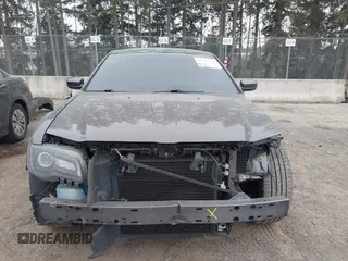 2019 Chrysler 300 S with VIN 2C3CCABG8KH601034, listed as a IAAI auction lot 41571454 with 104,632 mi miles and . Bid and sale history available at DreamBid. Image 13.