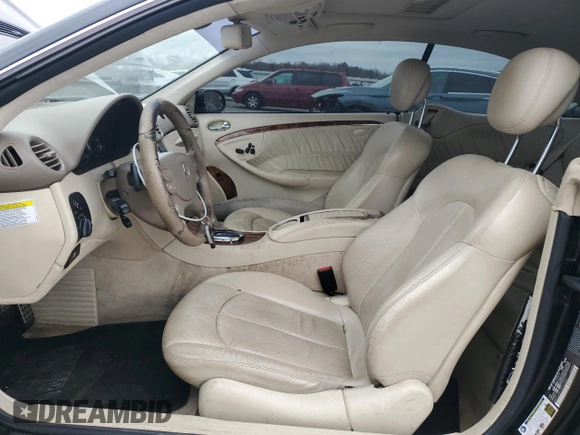 2009 Mercedes-Benz CLK 350 with VIN WDBTJ56H79F268881, listed as a Copart auction lot 79598644 with 147,088 mi miles and Salvage Title. Bid and sale history available at DreamBid. Image 7.
