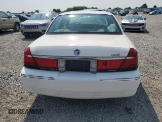 2002 Mercury Grand Marquis LS Premium z VIN 2MEFM75W52X666147, wystawiony jako Copart lot #58970815 z przebiegiem 133 495 mil mil oraz Szkoda całkowita • Salvage title. Historia ofert i sprzedaży dostępna na DreamBid. Obrazek 6.