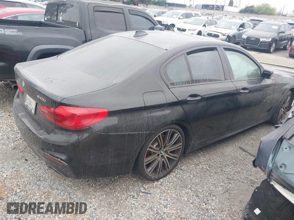 2018 BMW 5 Series 540i z VIN WBAJE5C5XJWA97667, wystawiony jako IAAI lot #41481362 z przebiegiem Nie podano mil oraz . Historia ofert i sprzedaży dostępna na DreamBid. Obrazek 4.