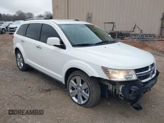 2012 Dodge Journey Crew with VIN 3C4PDCDG8CT342184, listed as a IAAI auction lot 41542695 with 205,215 mi miles and . Bid and sale history available at DreamBid. Image 1.