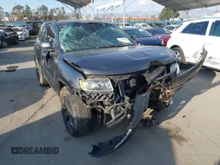 2014 Jeep Grand Cherokee Laredo with VIN 1C4RJEAG8EC529103, listed as a IAAI auction lot 41567193 with 163,944 mi miles. Bid and sale history available at carsss.com. Image 1.