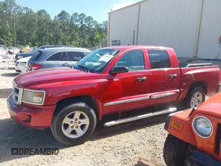 2009 Dodge Dakota SXT with VIN 1D7HE38K49S778966, listed as a IAAI auction lot 42034664 with 169,756 mi miles and . Bid and sale history available at carsss.com. Image 2.
