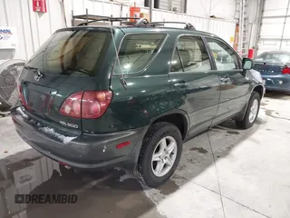 1999 Lexus RX 300 Luxury SUV with VIN JT6GF10U7X0036842, listed as a IAAI auction lot 41714651 with 238,904 mi miles. Bid and sale history available at carsss.com. Image 4.