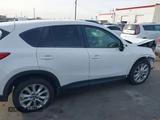 2015 Mazda CX-5 Grand Touring with VIN JM3KE4DY3F0483629, listed as a IAAI auction lot 41054059 with 118,980 mi miles. Bid and sale history available at carsss.com. Image 12.