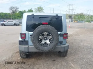 2012 Jeep Wrangler Arctic with VIN 1C4GJWBG3CL172602, listed as a IAAI auction lot 42154652 with 71,470 mi miles and . Bid and sale history available at DreamBid. Image 16.