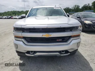 2016 Chevrolet Silverado 1500 LT with VIN 3GCUKREC8GG375823, listed as a Copart auction lot 55249625 with 113,232 mi miles and Salvage Title. Bid and sale history available at DreamBid. Image 5.
