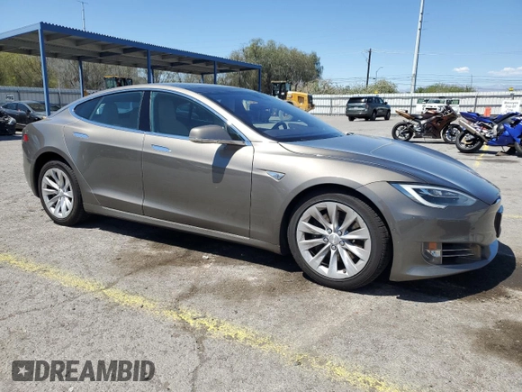 2016 Tesla Model S 70 with VIN 5YJSA1E1XGF147239, listed as a Copart auction lot 56529075 with 82,562 mi miles and Salvage title. Bid and sale history available at DreamBid. Image 4.