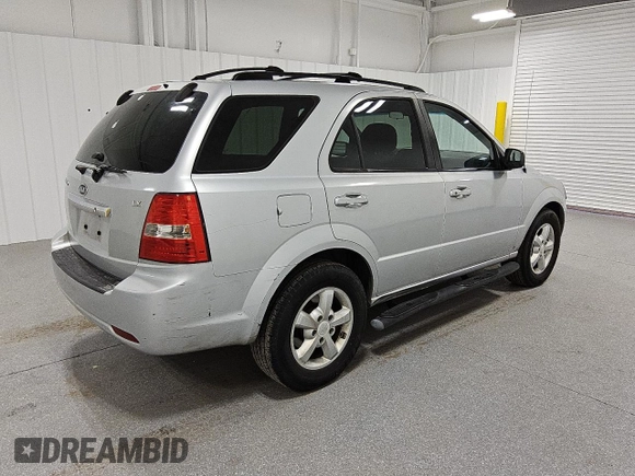 2007 Kia Sorento LX z VIN KNDJD736075700860, wystawiony jako Copart lot #82119114 z przebiegiem 290 641 mil mil oraz Czysty tytuł • Clean title. Historia ofert i sprzedaży dostępna na DreamBid. Obrazek 3.