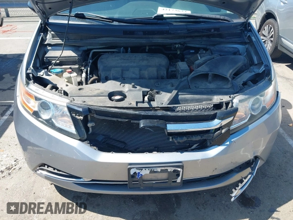 2016 Honda Odyssey LX z VIN 5FNRL5H22GB092614, wystawiony jako IAAI lot #42173633 z przebiegiem 159 387 mil mil oraz . Historia ofert i sprzedaży dostępna na DreamBid. Obrazek 10.