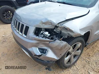2014 Jeep Grand Cherokee Limited with VIN 1C4RJFBG9EC210507, listed as a IAAI auction lot 42428788 with 141,147 mi miles and . Bid and sale history available at DreamBid. Image 6.