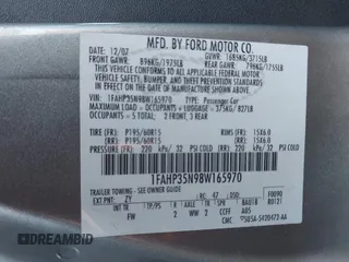2008 Ford Focus SE with VIN 1FAHP35N98W165970, listed as a IAAI auction lot 42028598 with 242,004 mi miles and . Bid and sale history available at carsss.com. Image 9.