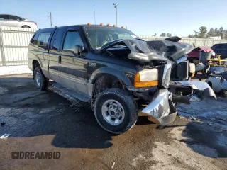 1999 Ford F-250 XL with VIN 1FTNX21L7XED97757, listed as a Copart auction lot 42296985 with 168,728 mi miles and Salvage title. Bid and sale history available at DreamBid. Image 4.
