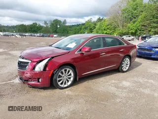 2016 Cadillac XTS Luxury Collection with VIN 2G61M5S31G9133513, listed as a IAAI auction lot 42289442 with 68,613 mi miles and . Bid and sale history available at DreamBid. Image 2.