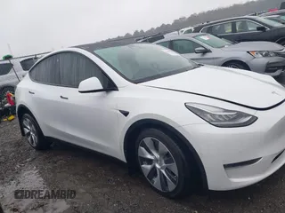 2021 Tesla Model Y Long Range with VIN 5YJYGDEEXMF228914, listed as a IAAI auction lot 41409806 with 48,276 mi miles. Bid and sale history available at carsss.com. Image 13.