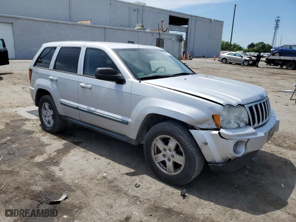2007 Jeep Grand Cherokee Laredo with VIN 1J8GR48K27C681832, listed as a Copart auction lot 54306725 with 230,673 mi miles and Clean Title. Bid and sale history available at carsss.com. Image 4.