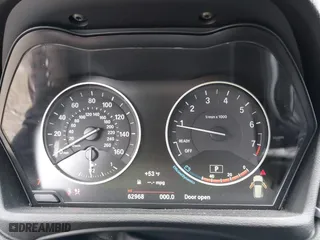 2018 BMW X1 xDrive28i with VIN WBXHT3C34J5K21576, listed as a IAAI auction lot 41822390 with 69,645 mi miles. Bid and sale history available at carsss.com. Image 7.