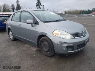 2009 Nissan Versa 1.8 SL with VIN 3N1BC11EX9L403728, listed as a IAAI auction lot 41912469 with 119,324 mi miles. Bid and sale history available at carsss.com. Image 1.