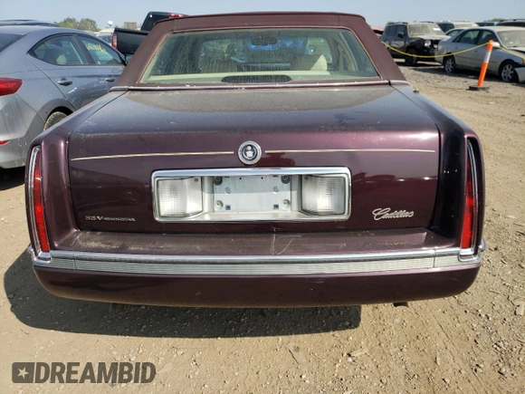1995 Cadillac Concours z VIN 1G6KF52Y1SU245573, wystawiony jako Copart lot #68715984 z przebiegiem Nie podano mil oraz Szkody całkowita. Historia ofert i sprzedaży dostępna na DreamBid. Obrazek 6.