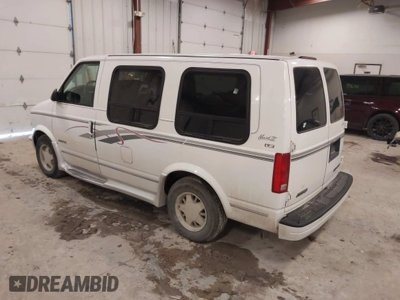 1998 Chevrolet Astro Cargo Van YF7 Upfitter with VIN 1GBDM19W1WB121821, listed as a IAAI auction lot 41463704 with 141,724 mi miles. Bid and sale history available at carsss.com. Image 3.