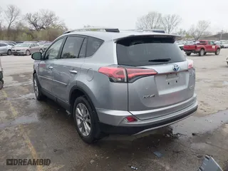 2017 Toyota RAV4 Hybrid Limited with VIN JTMDJREV5HD140010, listed as a IAAI auction lot 41925106 with 97,835 mi miles. Bid and sale history available at carsss.com. Image 3.