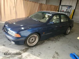 2000 BMW 5 Series 528iA with VIN WBADM6346YGU08106, listed as a Copart auction lot 84322434 with 298,587 mi miles and Clean Title. Bid and sale history available at carsss.com. Image 1.