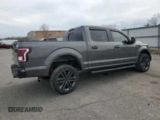 2015 Ford F-150 XLT with VIN 1FTEW1E87FFC44971, listed as a Copart auction lot 51836635 with 206,184 mi miles and Salvage Title. Bid and sale history available at DreamBid. Image 3.