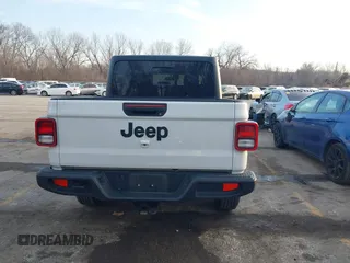 2023 Jeep Gladiator Sport S z VIN 1C6HJTAG7PL535209, wystawiony jako IAAI lot #41483780 z przebiegiem 39 376 mil mil oraz . Historia ofert i sprzedaży dostępna na DreamBid. Obrazek 16.