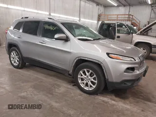2014 Jeep Cherokee Altitude with VIN 1C4PJMCB9EW149754, listed as a IAAI auction lot 41983427 with 199,810 mi miles and . Bid and sale history available at DreamBid. Image 1.