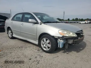 2004 Toyota Corolla CE with VIN 1NXBR32EX4Z334197, listed as a Copart auction lot 54705245 with 269,429 mi miles and Salvage Title. Bid and sale history available at DreamBid. Image 4.