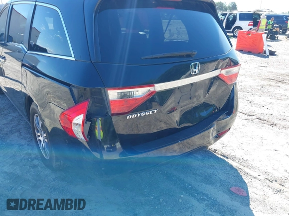 2011 Honda Odyssey EX-L with VIN 5FNRL5H67BB087064, listed as a IAAI auction lot 42326427 with 177,795 mi miles and . Bid and sale history available at DreamBid. Image 6.