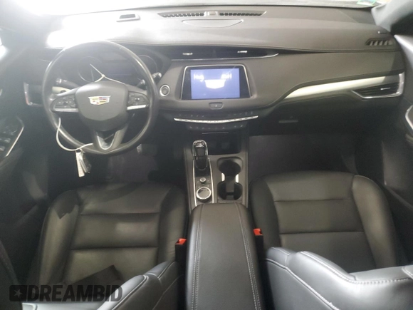2023 Cadillac XT4 AWD Premium Luxury z VIN 1GYFZDR43PF174188, wystawiony jako Copart lot #59106355 z przebiegiem 27 530 mil mil oraz Szkoda całkowita • Salvage title. Historia ofert i sprzedaży dostępna na DreamBid. Obrazek 8.