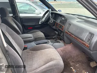 1996 Jeep Grand Cherokee Laredo with VIN 1J4GZ58S9TC161645, listed as a Copart auction lot 85896144 with 0 mi miles and Clean Title. Bid and sale history available at carsss.com. Image 5.