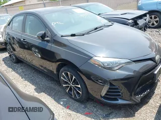 2017 Toyota Corolla L z VIN 2T1BURHE7HC772787, wystawiony jako IAAI lot #42189922 z przebiegiem 100 865 mil mil oraz . Historia ofert i sprzedaży dostępna na DreamBid. Obrazek 1.