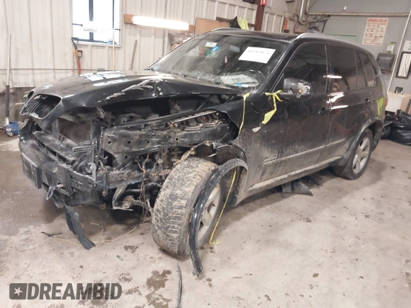 2012 BMW X5 35i with VIN 5UXZV4C50CL757568, listed as a IAAI auction lot 41315024 with 166,825 mi miles and . Bid and sale history available at DreamBid. Image 2.