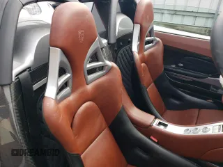 2004 Porsche Carrera GT z VIN WP0CA29894L001019, wystawiony jako Copart lot #52988584 z przebiegiem 4486 mil mil oraz Szkody całkowita. Historia ofert i sprzedaży dostępna na DreamBid. Obrazek 11.