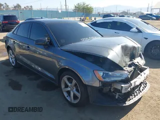 2016 Audi A3 Premium z VIN WAUA7GFF9G1003789, wystawiony jako IAAI lot #41993613 z przebiegiem 116 517 mil mil oraz . Historia ofert i sprzedaży dostępna na DreamBid. Obrazek 1.