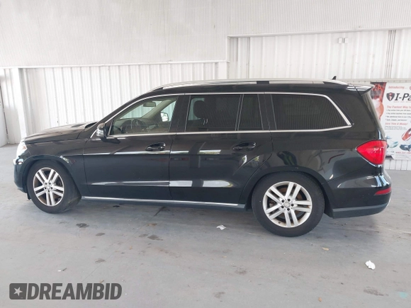 2014 Mercedes-Benz GL 450 z VIN 4JGDF7CE7EA435479, wystawiony jako IAAI lot #42280243 z przebiegiem 138 930 mil mil oraz . Historia ofert i sprzedaży dostępna na DreamBid. Obrazek 14.