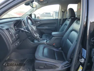 2021 GMC Canyon 4WD AT4 w/Cloth with VIN 1GTG6FEN5M1100096, listed as a Copart auction lot 77535584 with 25,152 mi miles and Salvage Title. Bid and sale history available at carsss.com. Image 7.