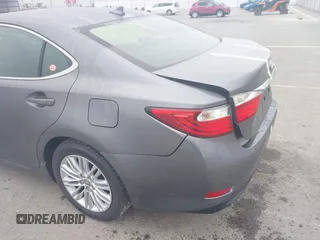 2014 Lexus ES 330 z VIN JTHBK1GGXE2148484, wystawiony jako IAAI lot #42186766 z przebiegiem 117 217 mil mil oraz . Historia ofert i sprzedaży dostępna na DreamBid. Obrazek 17.