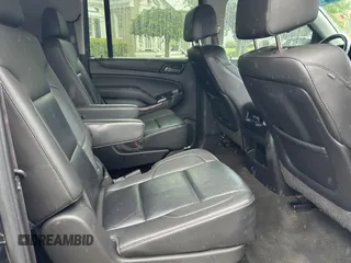 2015 Chevrolet Suburban LT z VIN 1GNSKJKC9FR696000, wystawiony jako Copart lot #59152535 z przebiegiem 146 457 mil mil oraz Czysty tytuł • Clean title. Historia ofert i sprzedaży dostępna na DreamBid. Obrazek 6.