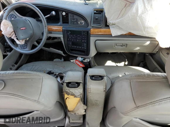 1999 Lincoln Continental with VIN 1LNHM97VXXY680512, listed as a Copart auction lot 58444304 with Not provided miles and Non repairable. Bid and sale history available at DreamBid. Image 8.