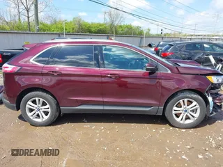 2020 Ford Edge SEL with VIN 2FMPK4J94LBA85551, listed as a IAAI auction lot 41994442 with 27,329 mi miles and . Bid and sale history available at DreamBid. Image 14.