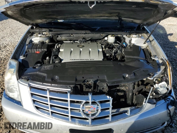 2009 Cadillac DTS 1SC z VIN 1G6KD57Y89U105190, wystawiony jako Copart lot #77560874 z przebiegiem 166 134 mil mil oraz Szkoda całkowita • Salvage title. Historia ofert i sprzedaży dostępna na DreamBid. Obrazek 11.