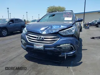 2018 Hyundai Santa Fe 2.0T z VIN 5XYZU4LA8JG537427, wystawiony jako IAAI lot #42349692 z przebiegiem 148 764 mil mil oraz . Historia ofert i sprzedaży dostępna na DreamBid. Obrazek 6.